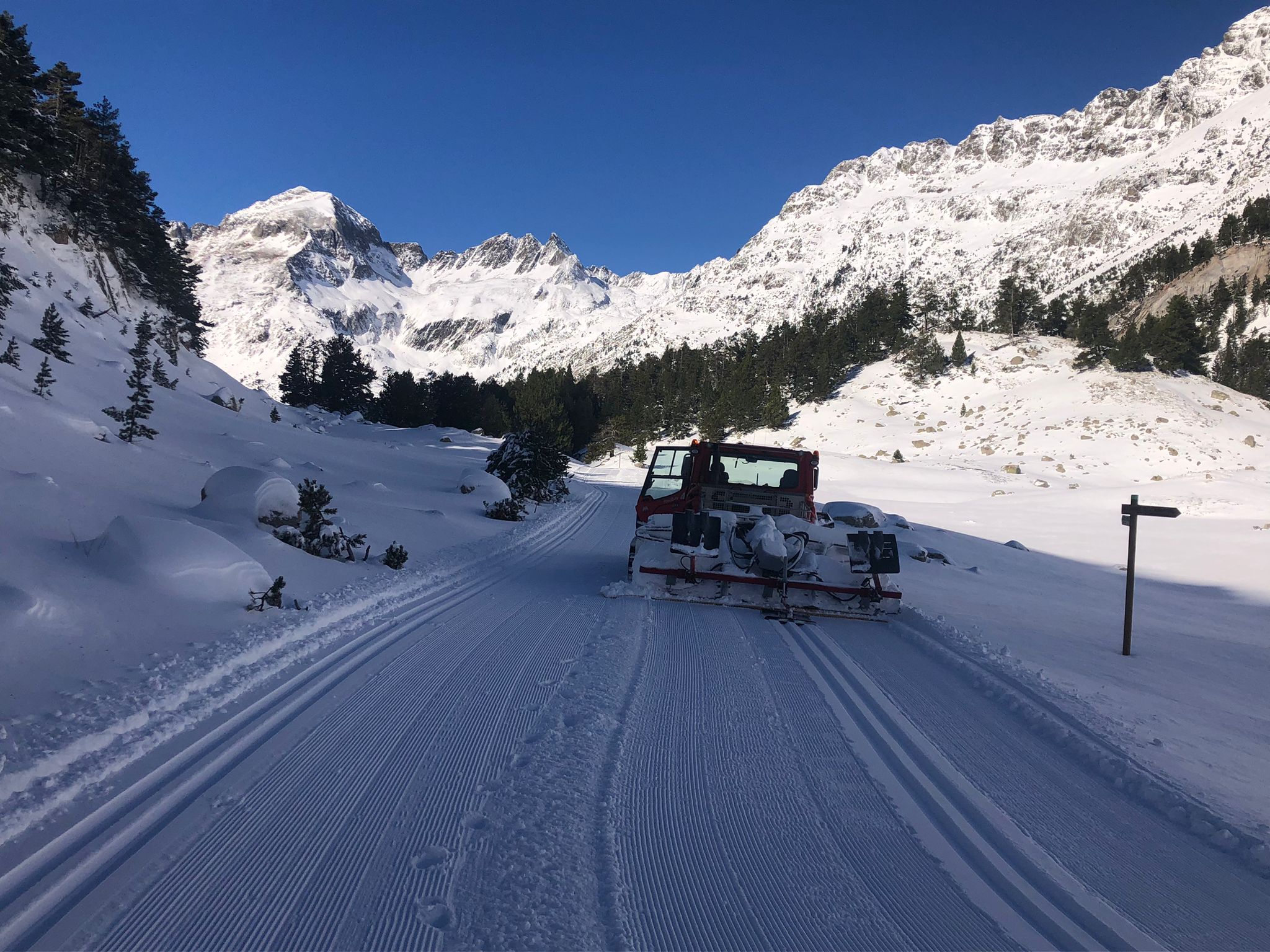 A Machine Prepares The Slopes Of The Benasque Nordic Ski Resort.